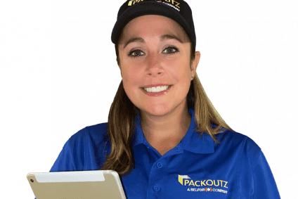 Blue Kangaroo Packoutz employee holding clipboard