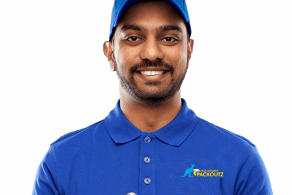 Male employee from Blue Kangaroo Packoutz, wearing blue shirt and holding clipboard