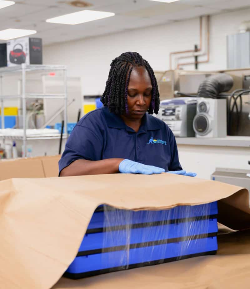 worker wrapping box